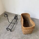 Magazine rack or log rack in straw with brutalist base from the 50s