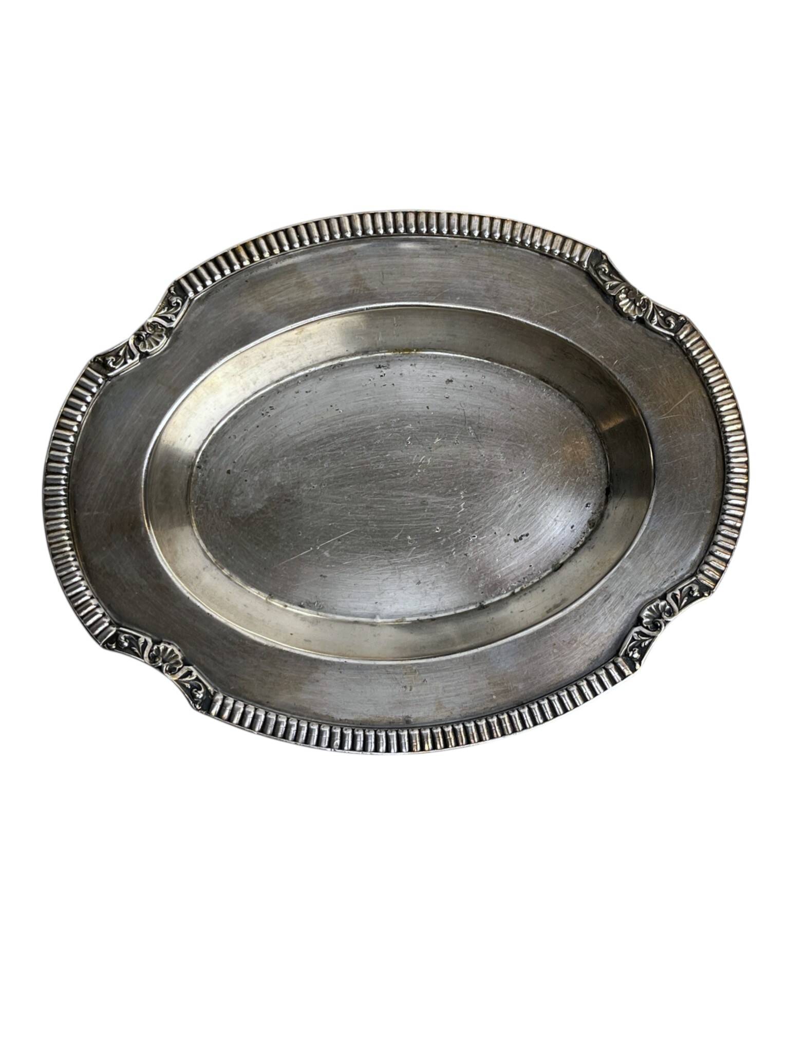 Oval metal silver-plated tray with hallmarks from the early 20th century.