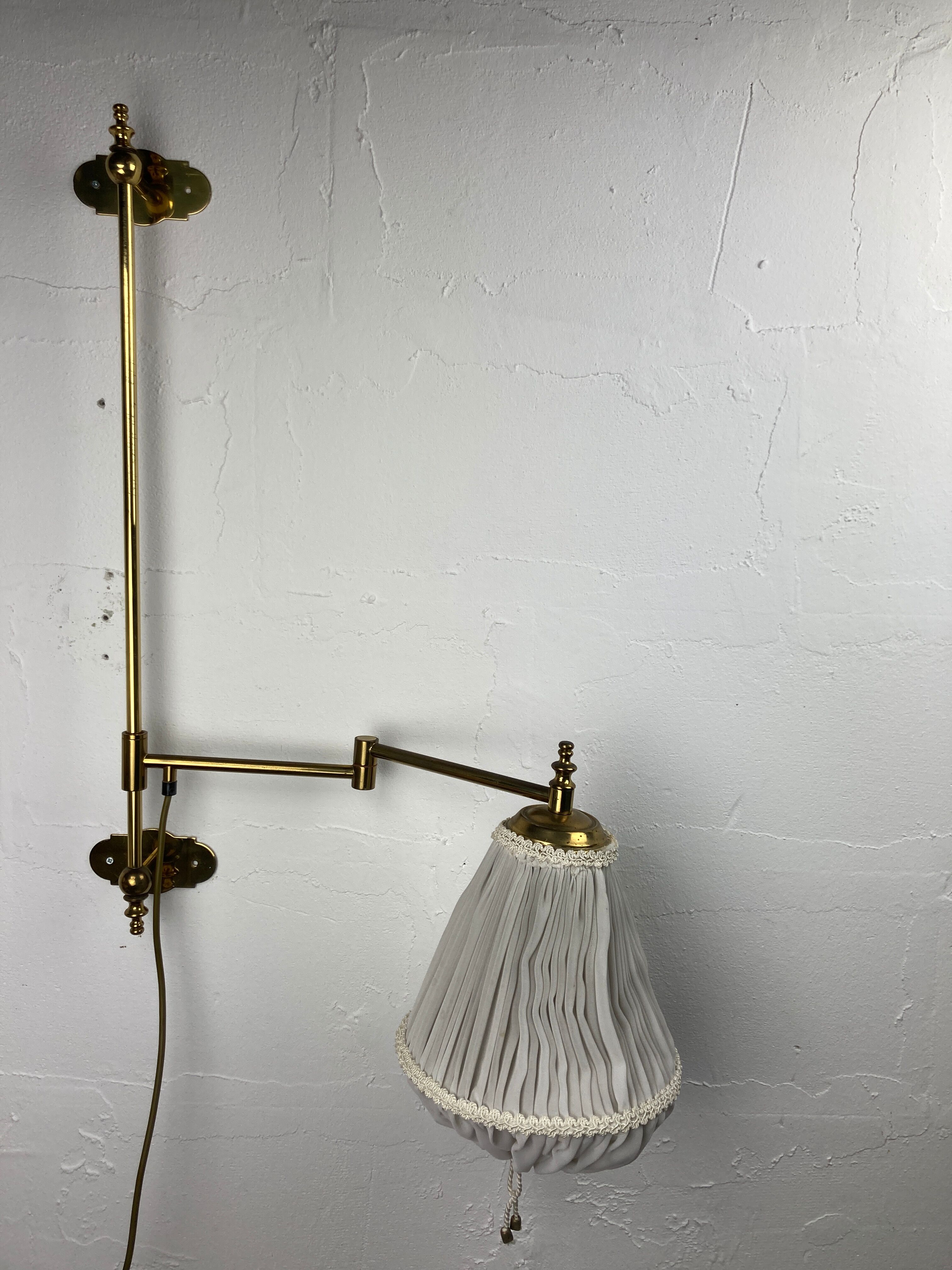 Brass art deco swivel arc wall lamp