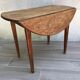 Table ronde à 2 rabats en bois vintage