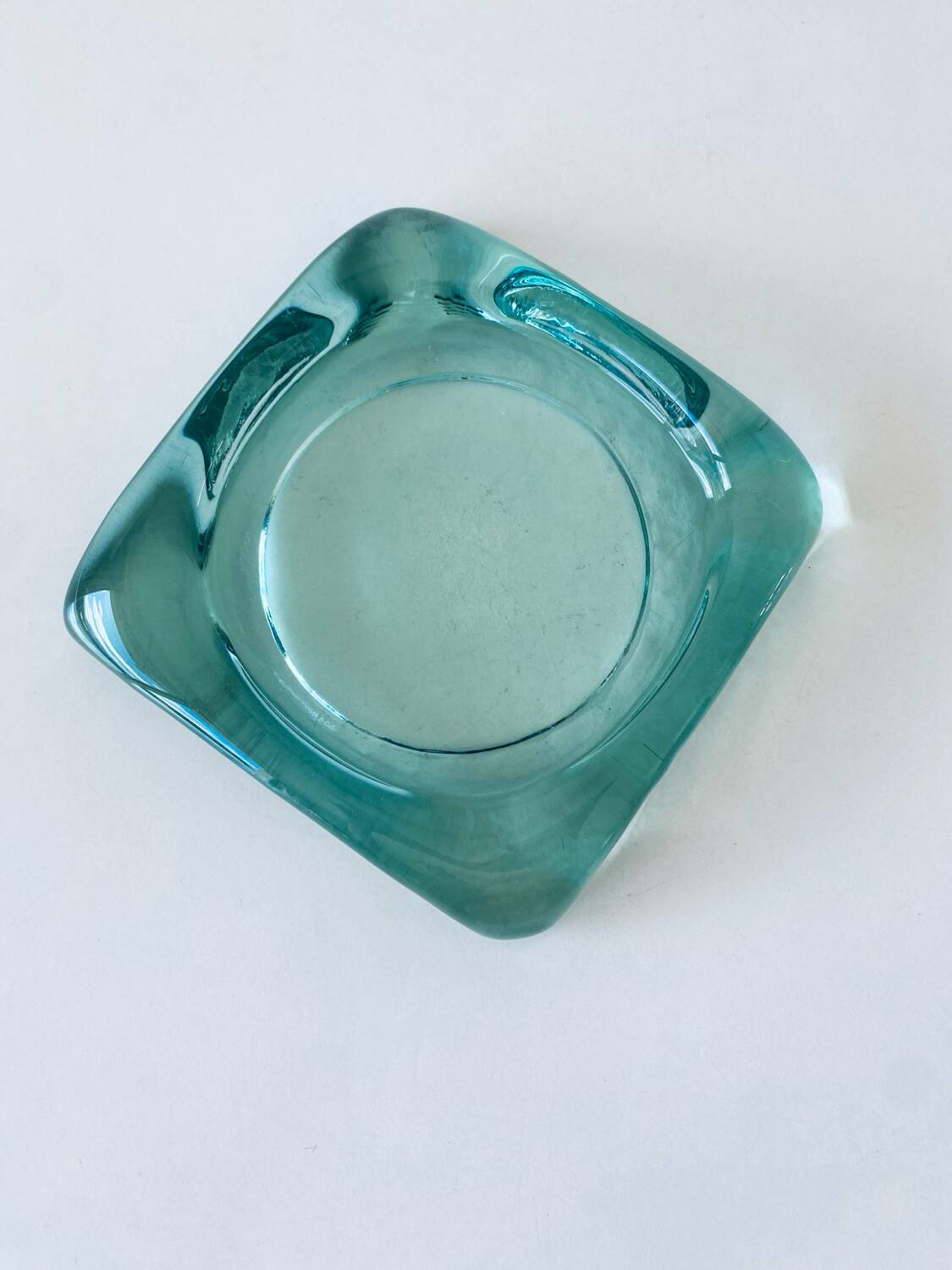 Glass tiled pocket emptier