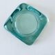 Glass tiled pocket emptier