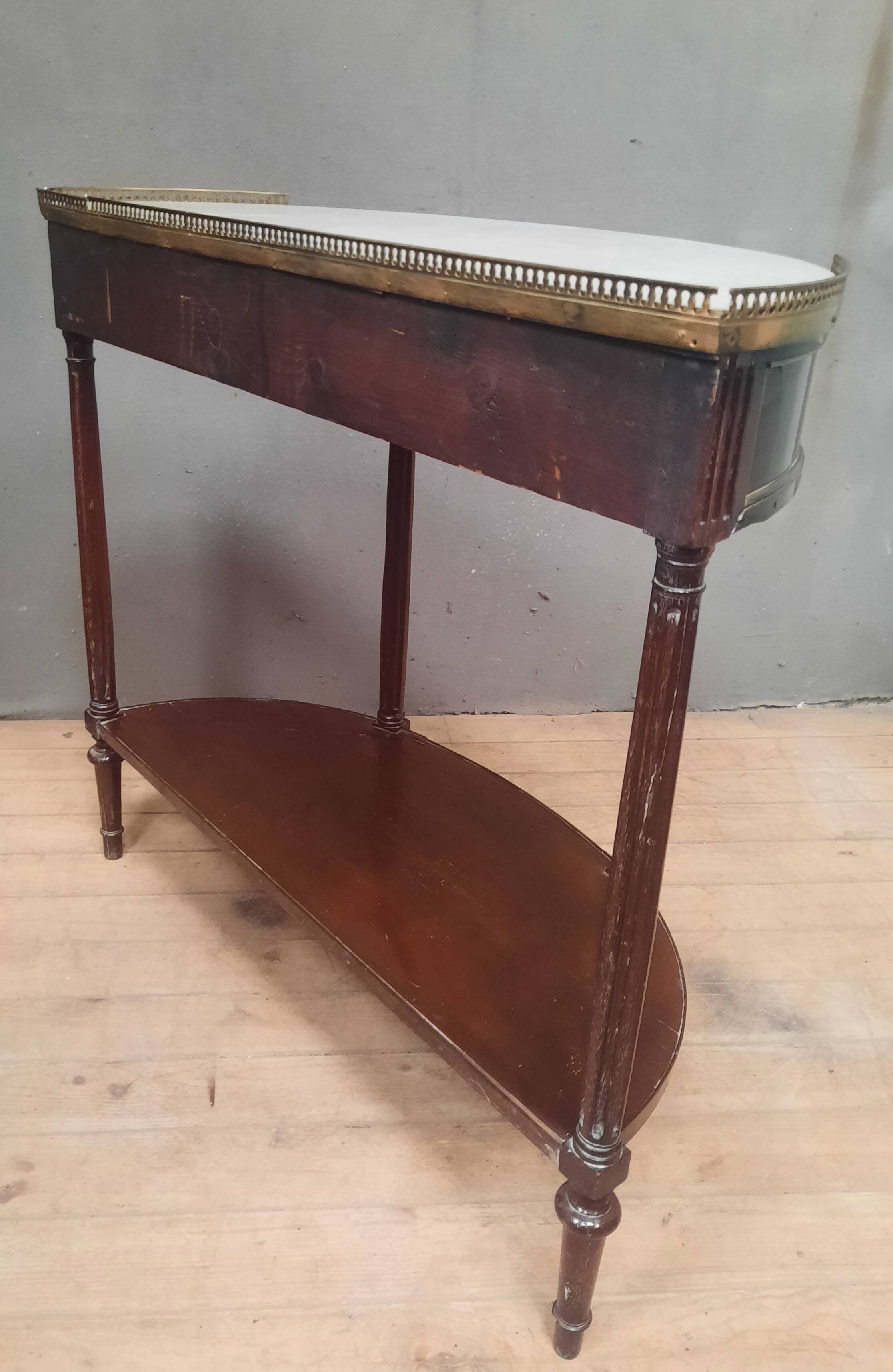 Louis XVI period demi-lune console in mahogany.