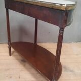 Louis XVI period demi-lune console in mahogany.