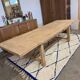 Solid oak extendable farmhouse table with 2 drawers.