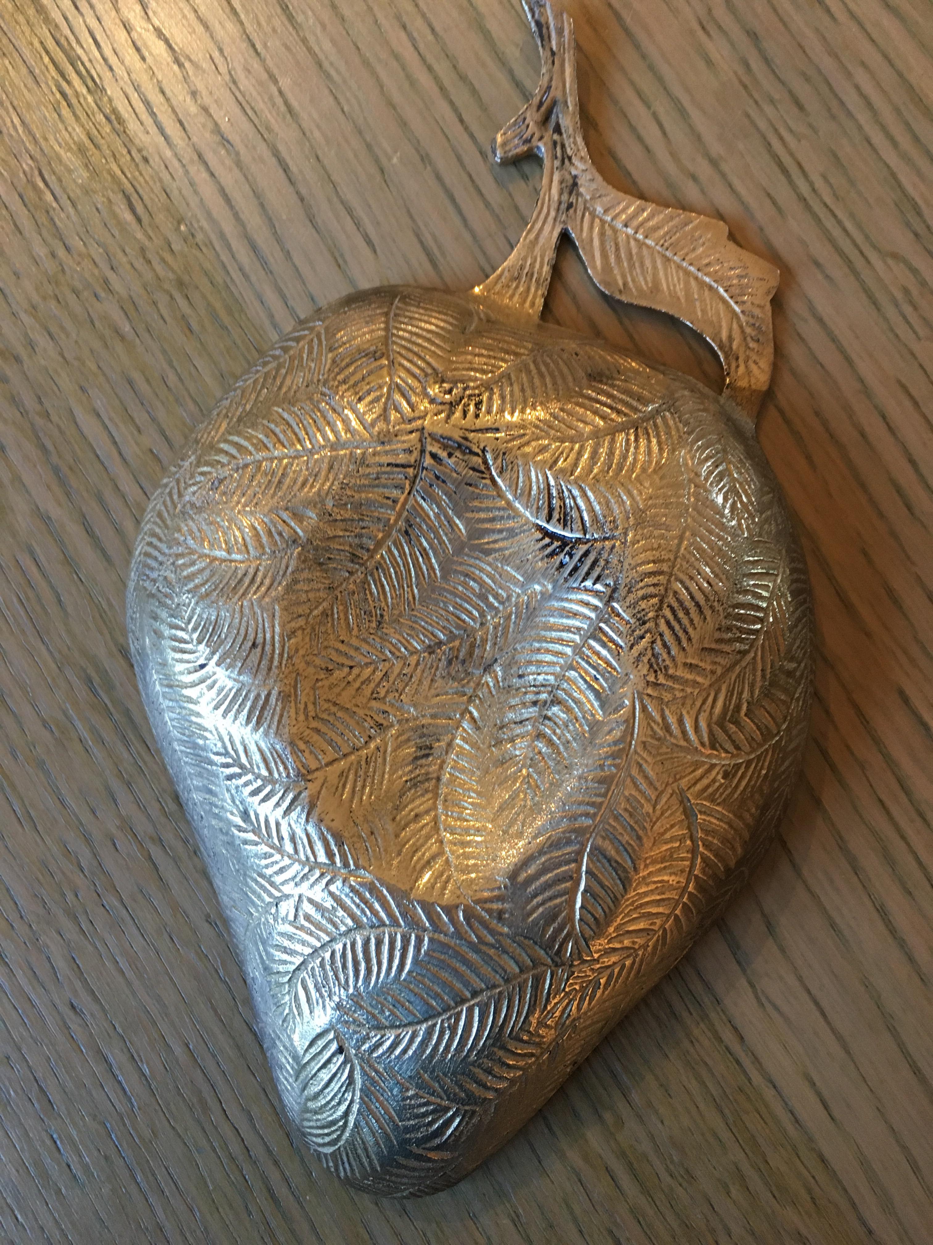 Empty vintage pocket in partitioned brass