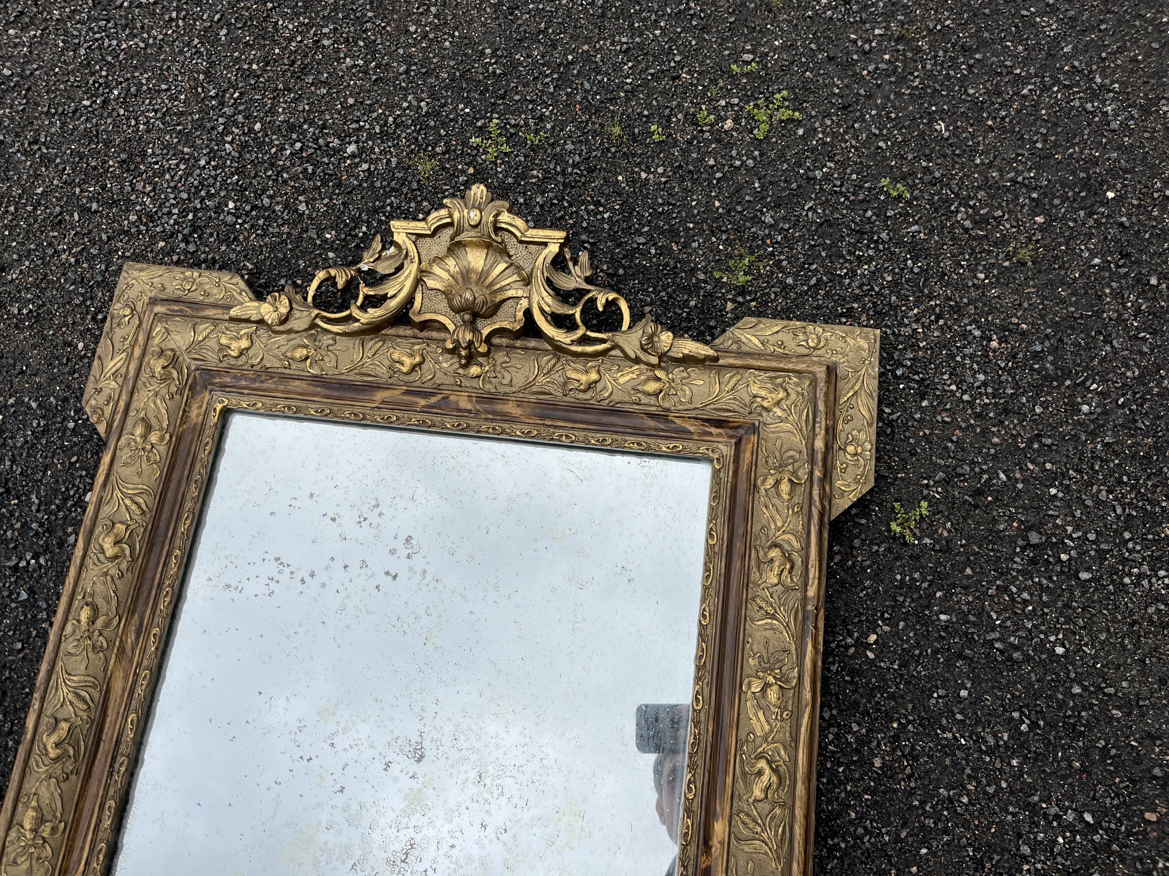 Antique mirror with gilded stucco, shell pediment, old glass, 95 cm