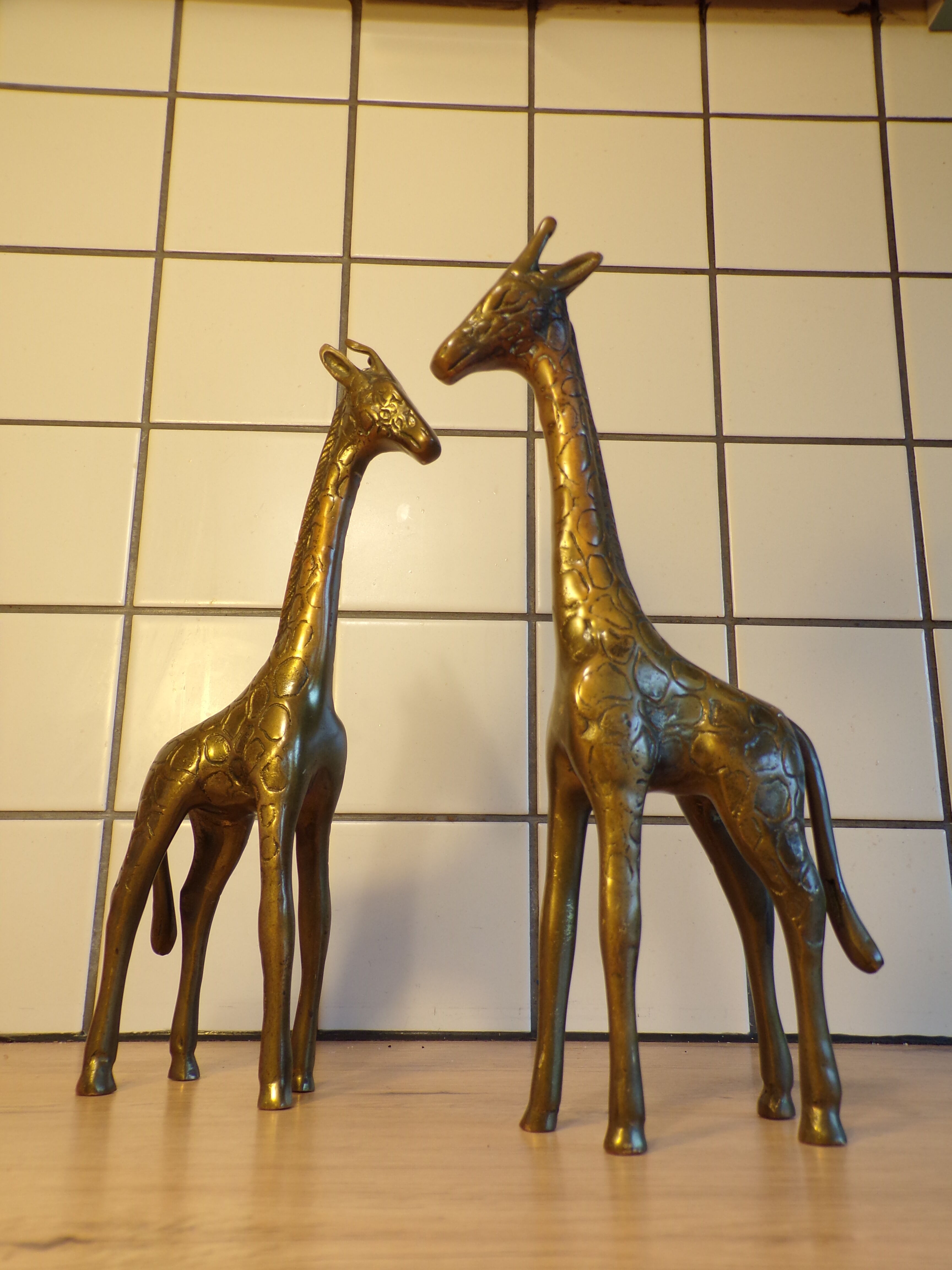 Pair of brass giraffes