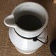 Antique milk jug