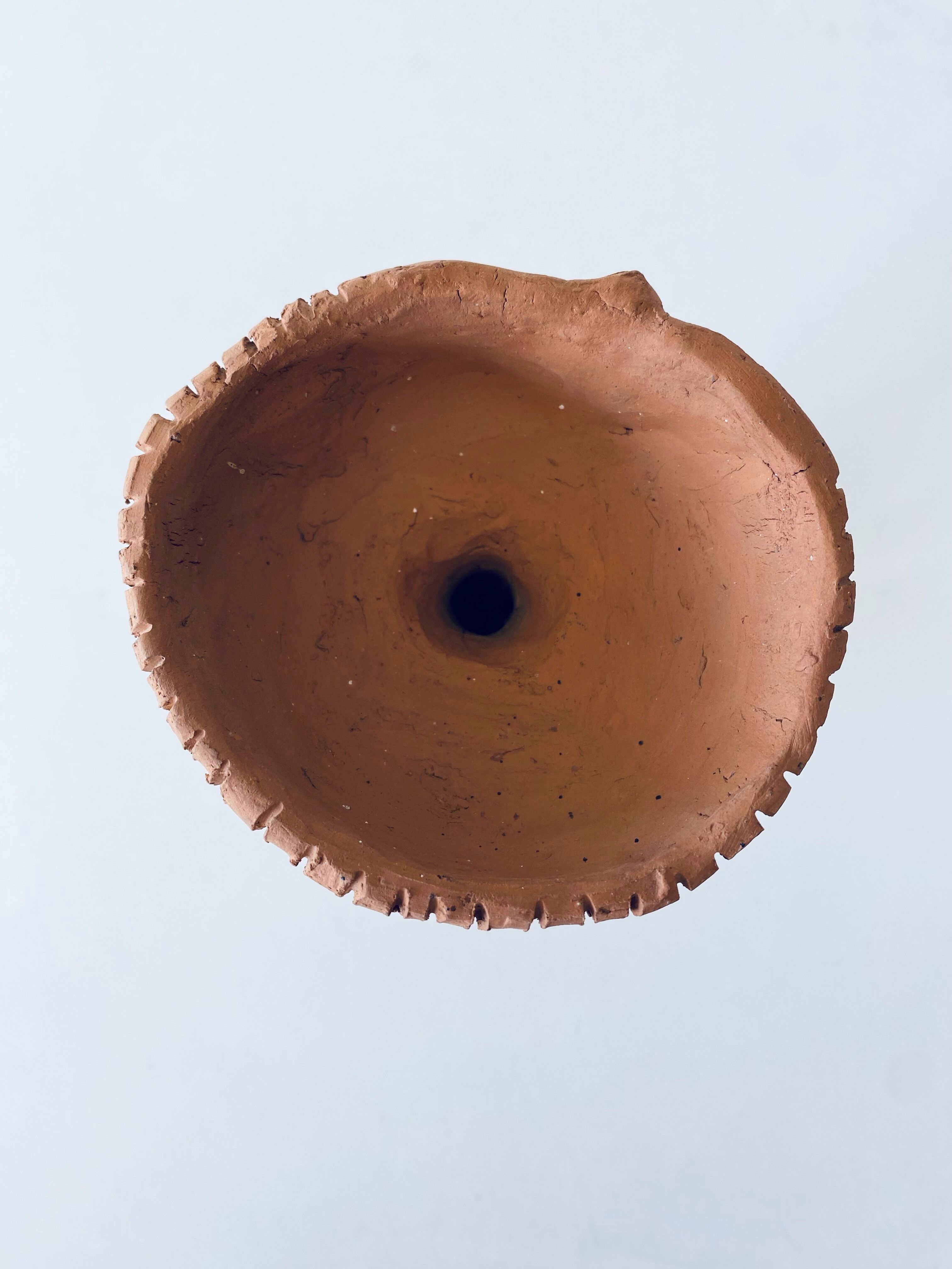 Terracotta personified vase