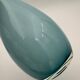 Blue lined glass bottle vase