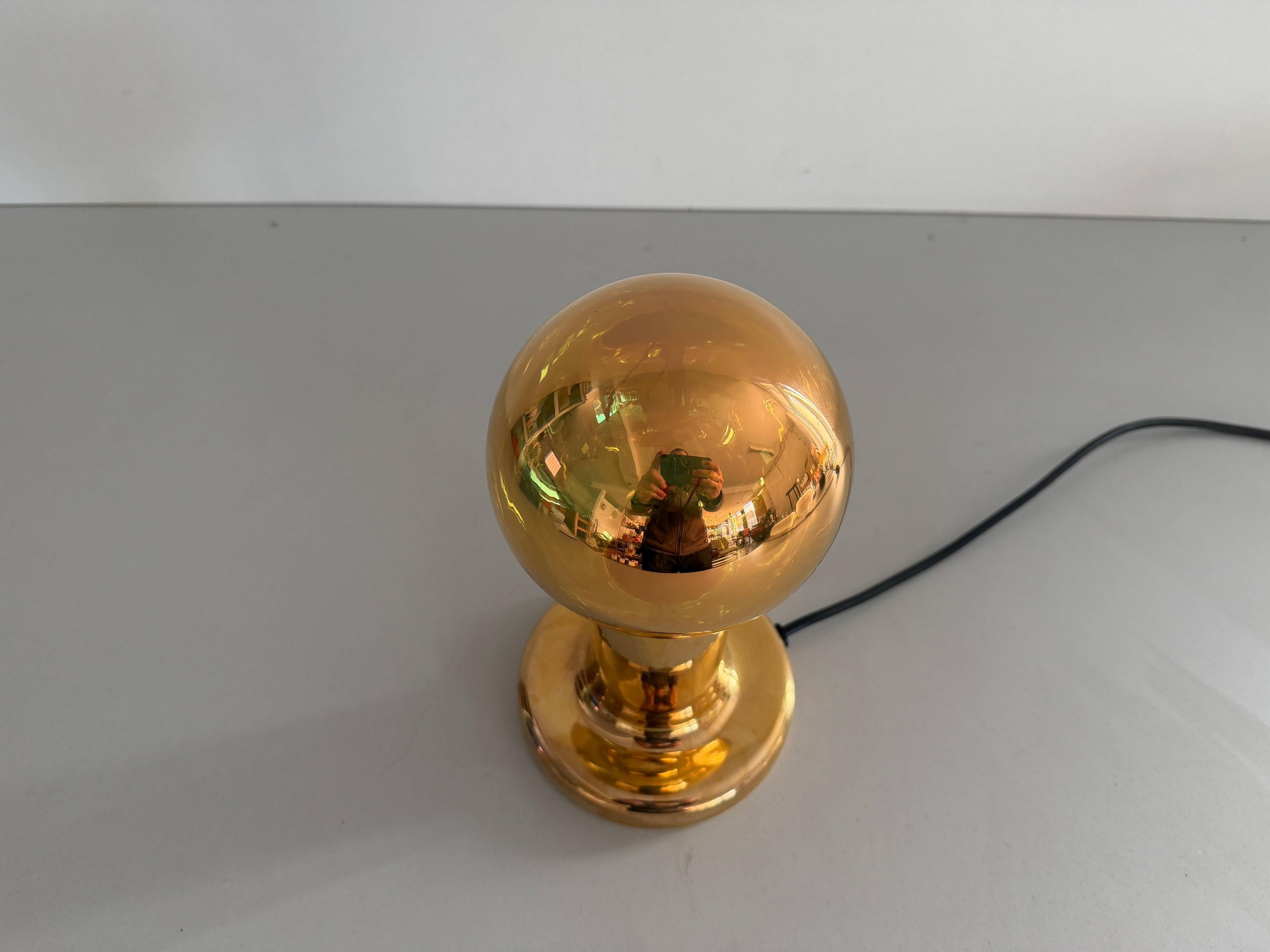 Simple table lamp in gilded porcelain by Philips NTD, 1960s, Germany.