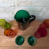 Mismatched colored glass orangeade set with pitcher and 6 glasses