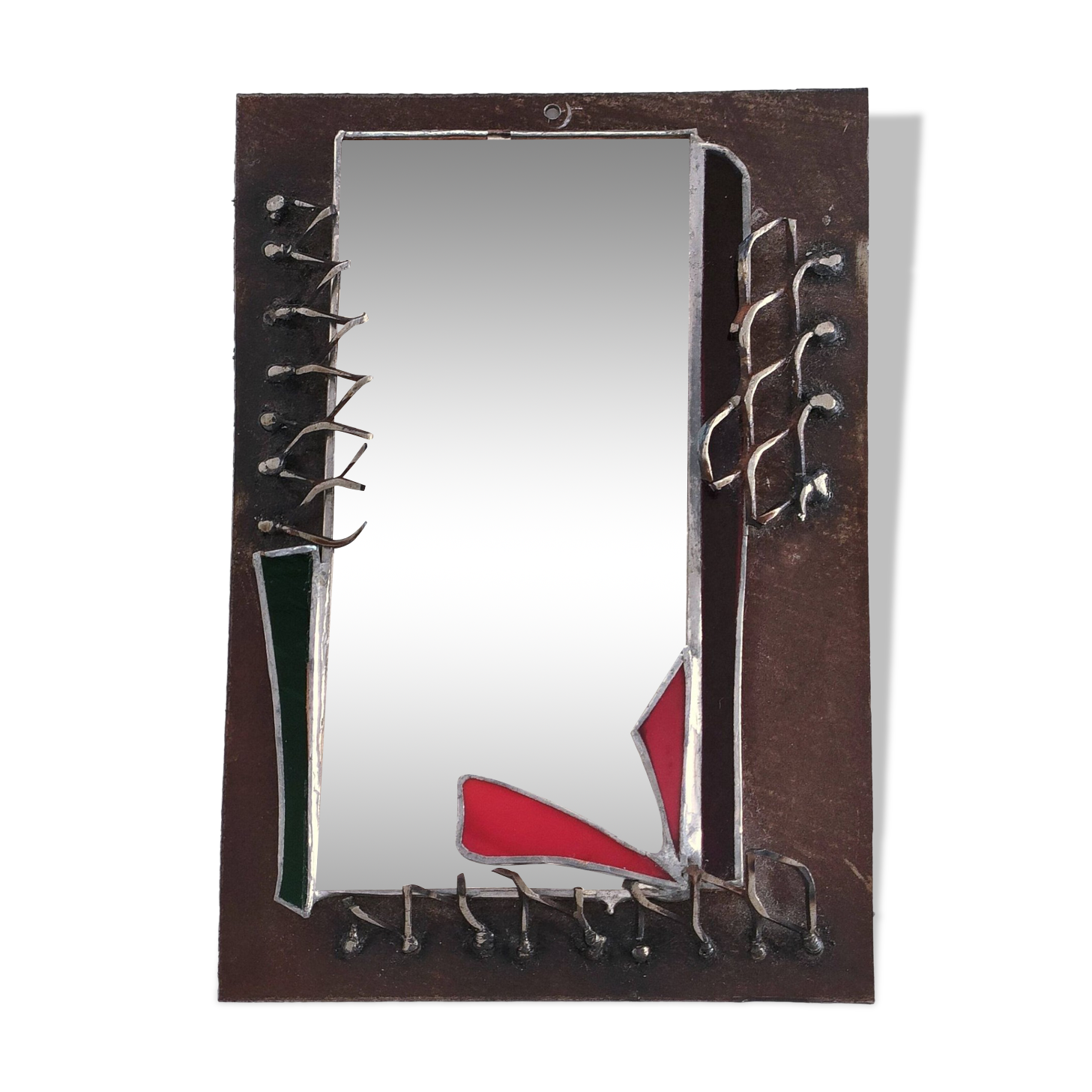 Brutalist mirror in metal and set glass
