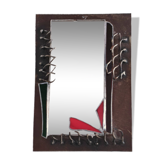 Brutalist mirror in metal and set glass