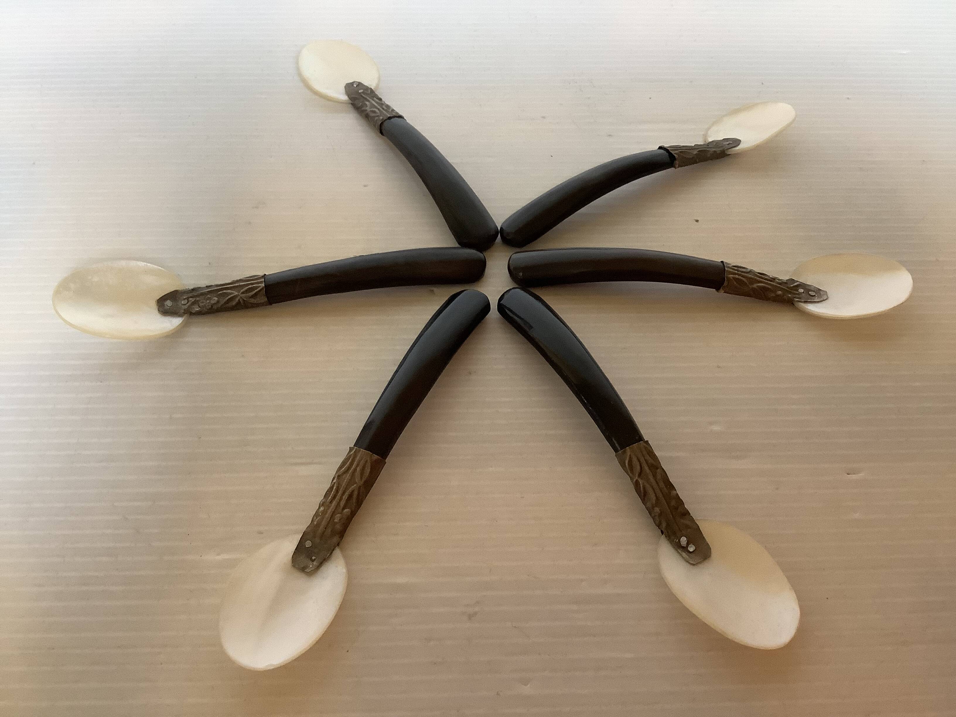 Six antique mother-of-pearl caviar spoons