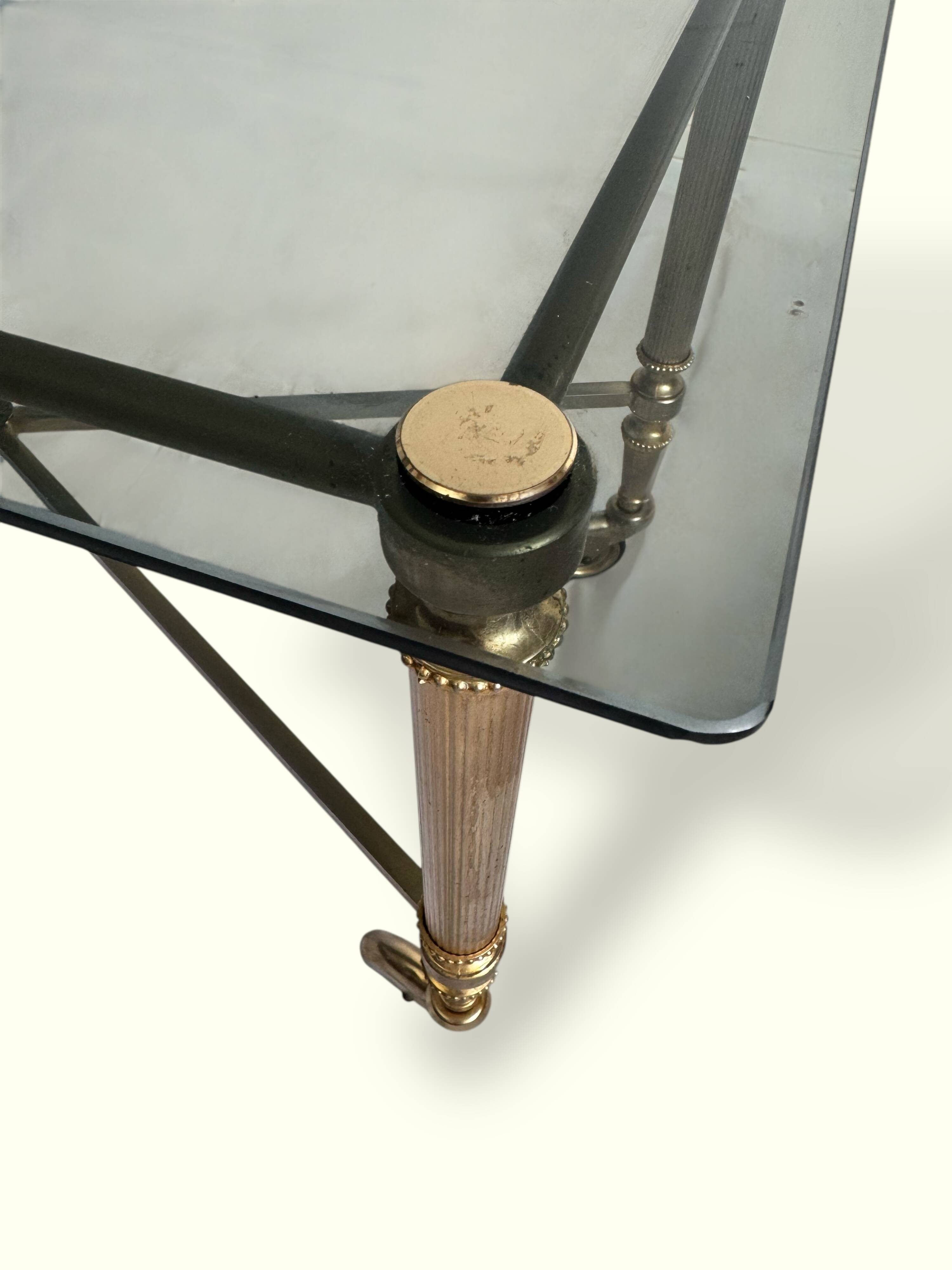 Brass and smoked glass coffee table, neoclassical design.