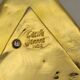 Cecile & jeanne: triangular gold-plated metal pocket tray with hieroglyph decoration.