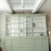 Large green display cabinet with sliding doors – two-part buffet, 219 cm