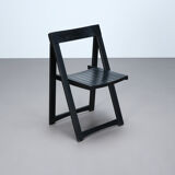 Set of three black folding chairs circa 1980