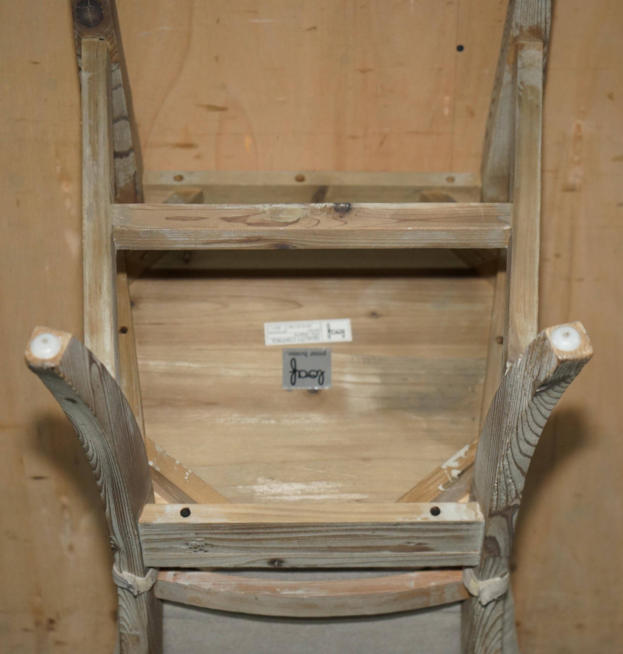 Pair of Swedish-style accent chairs in recycled pine with upholstered seats.