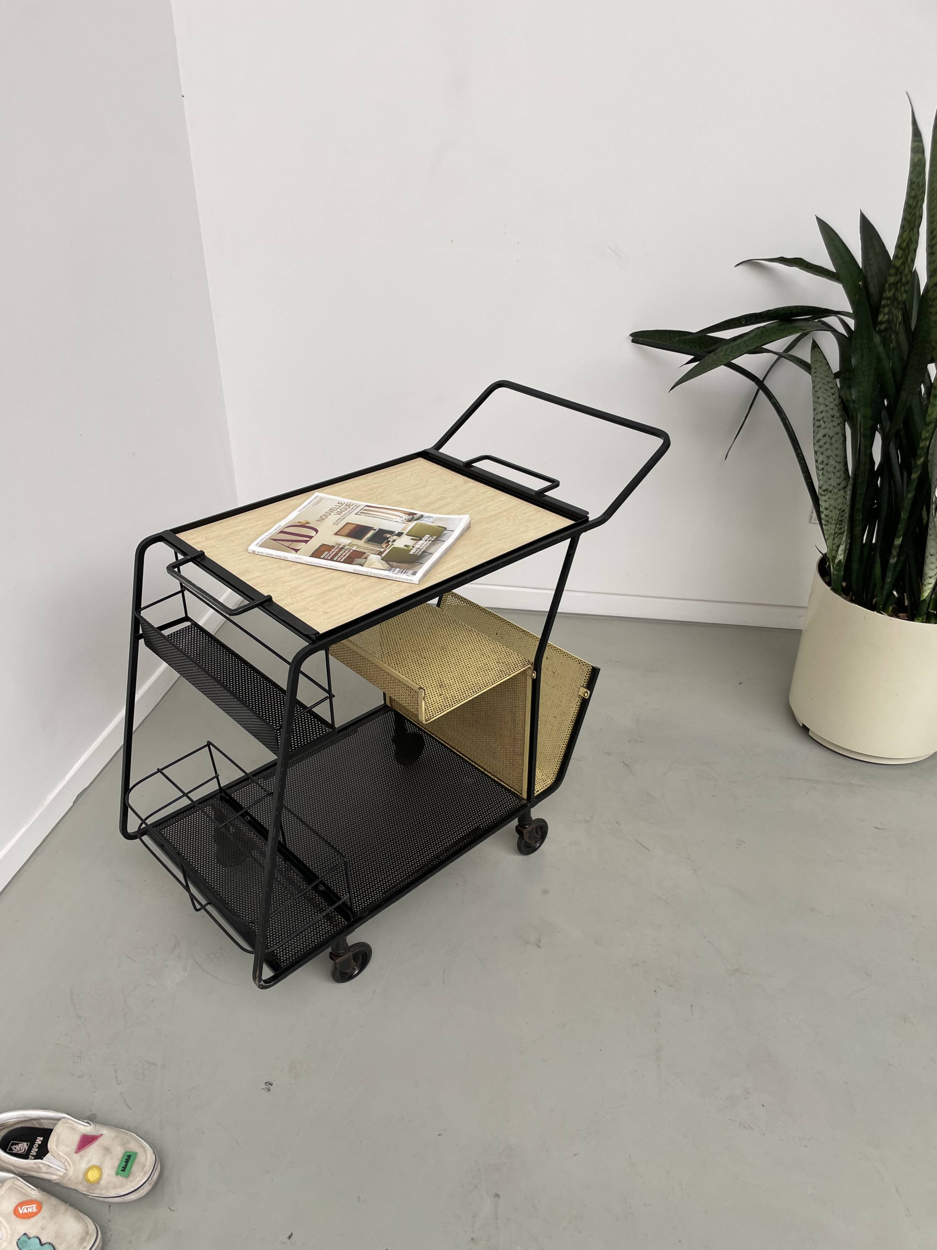 Perforated metal serving trolley in the Mathieu Matégot style