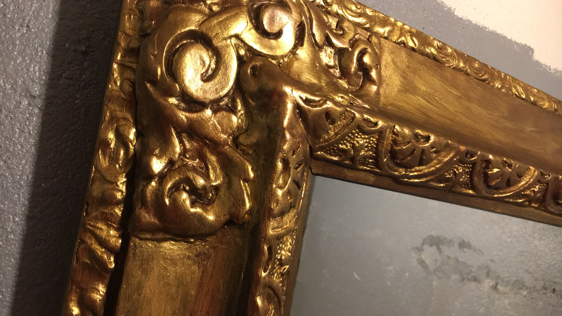 Mirror in gold frame