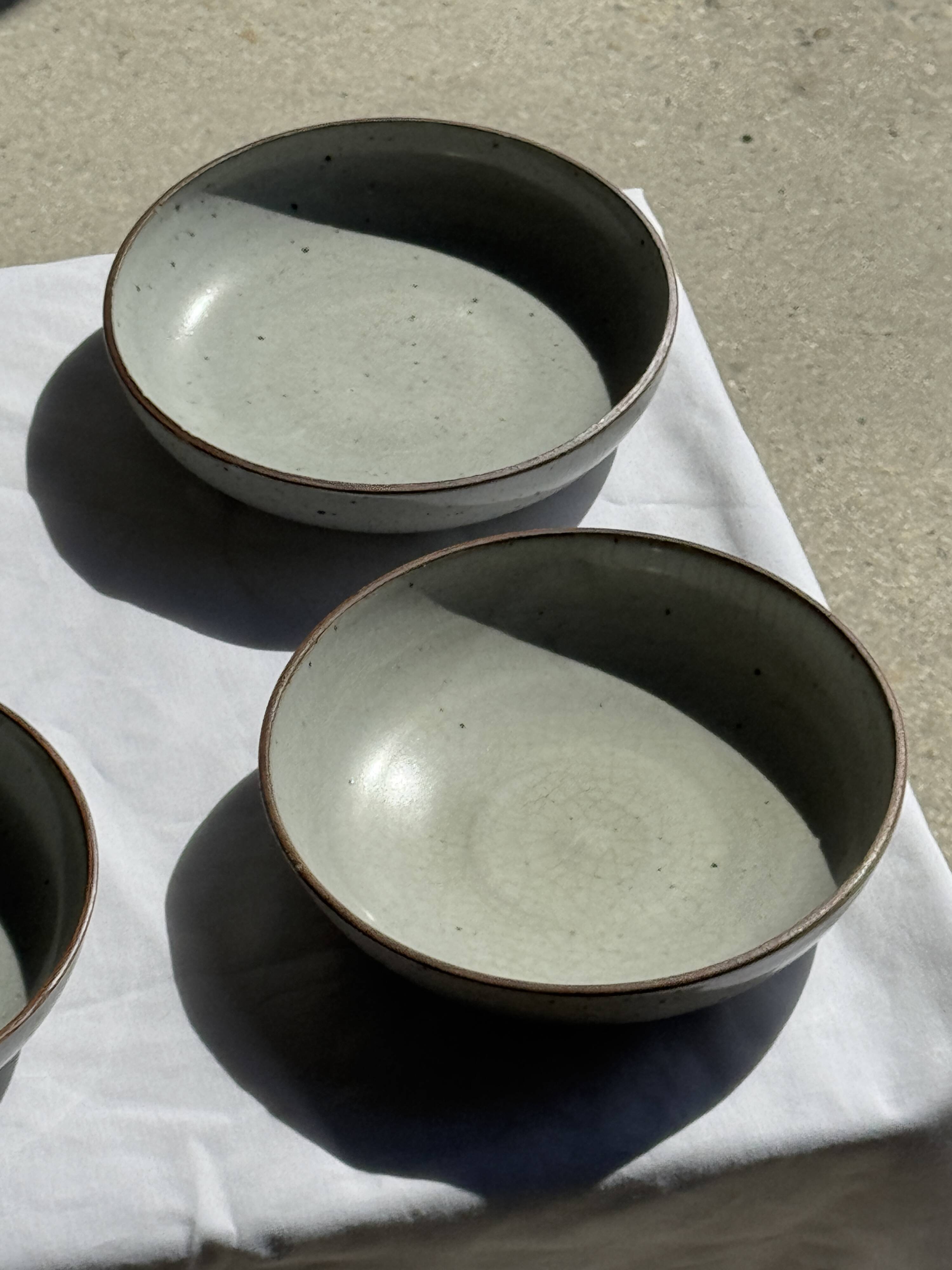 Set of 7 handmade grey glazed ceramic deep plates D18.5 H5.