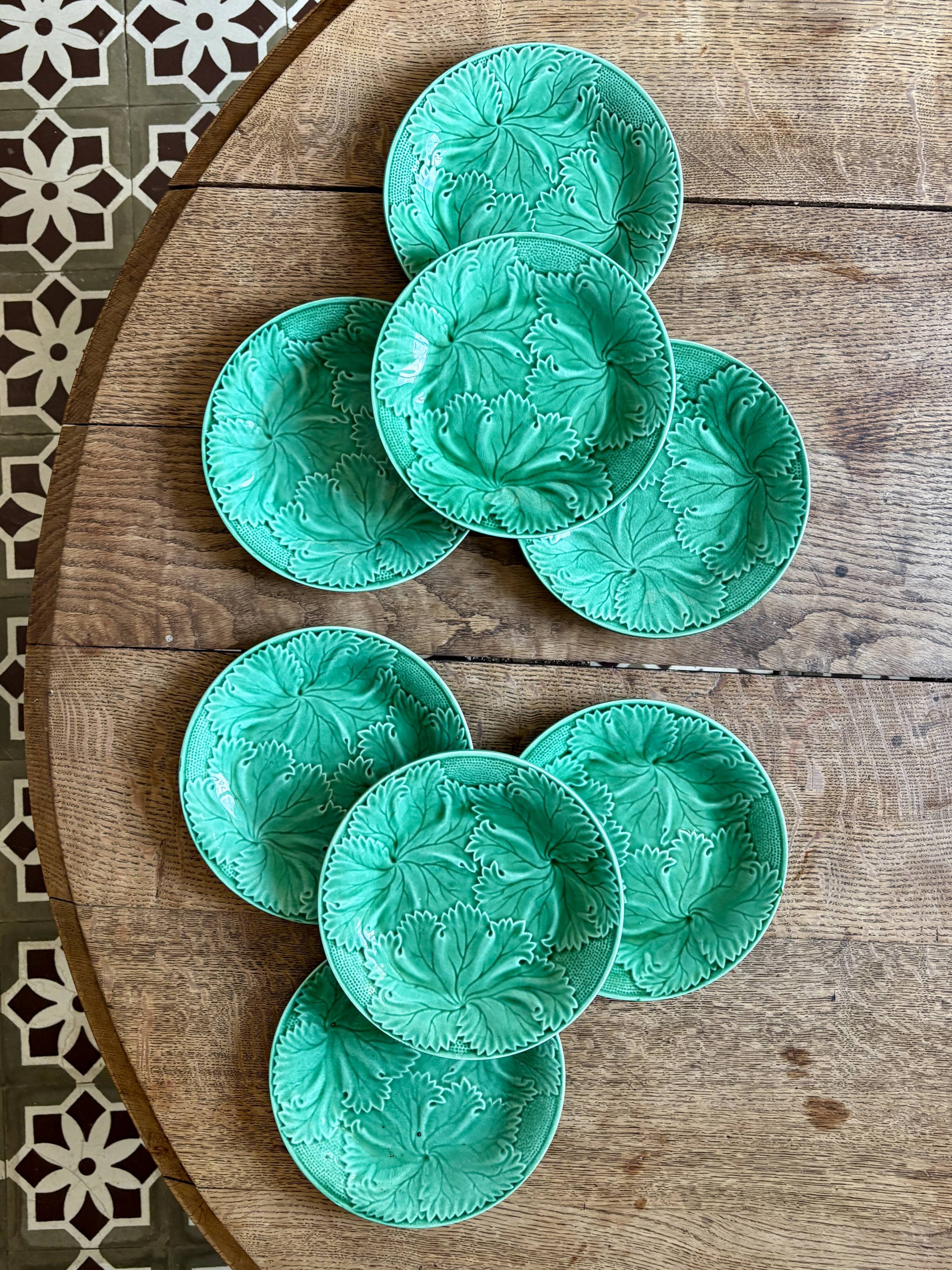 Set of 8 vintage green faience dessert plates, majolica.