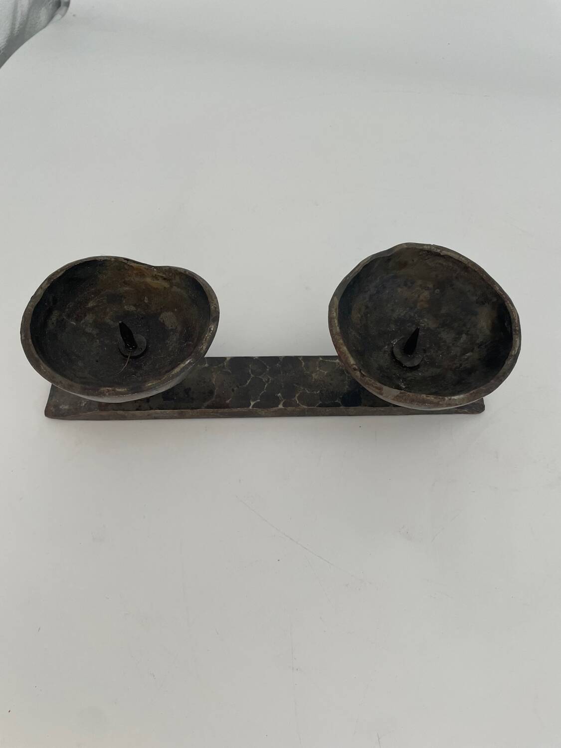 Wrought iron candlestick in brutalist style