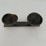 Wrought iron candlestick in brutalist style