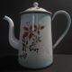 Enamelled sheet metal pourer decorated with black berries early twentieth century