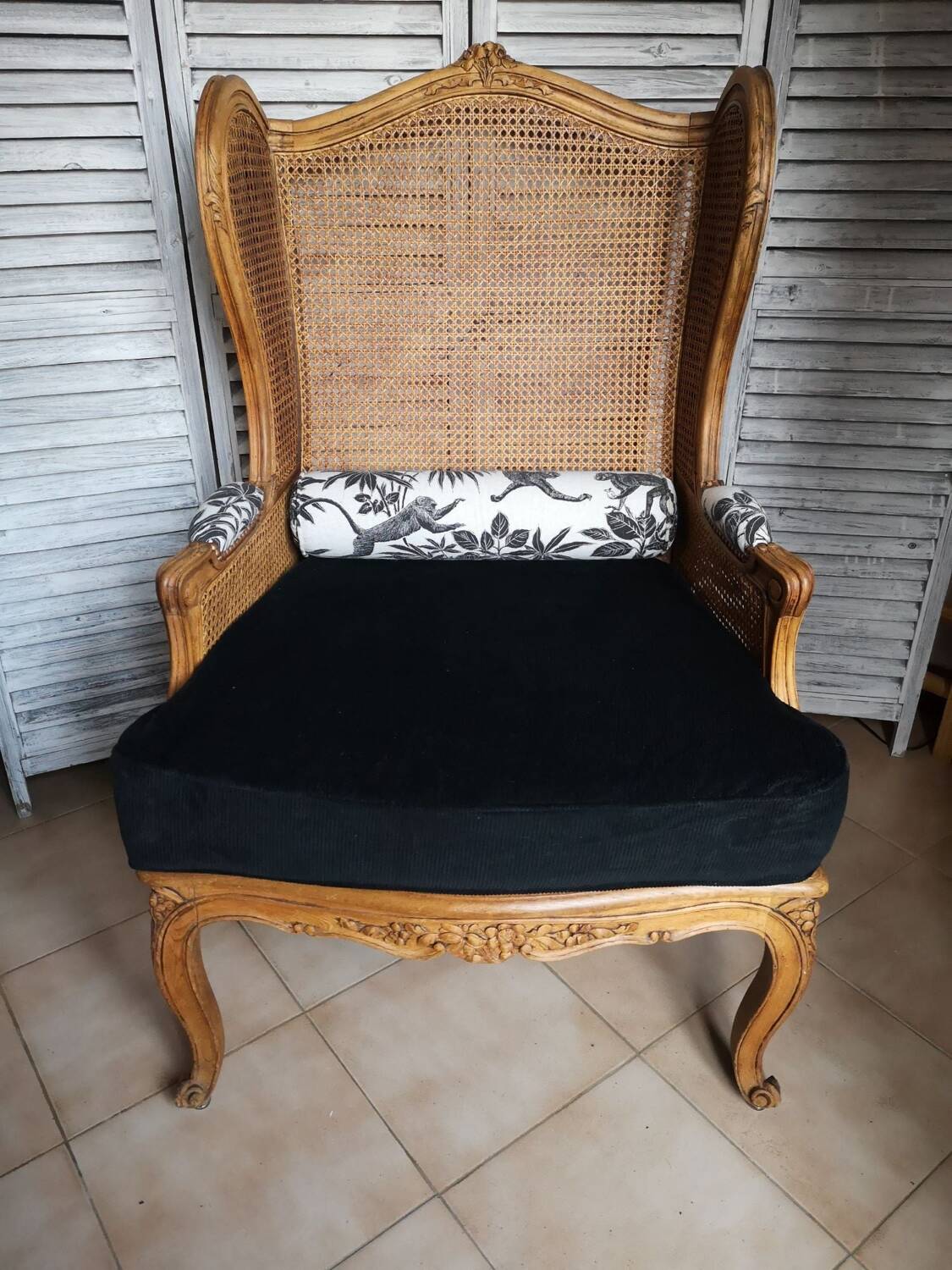 Antique wingback armchair