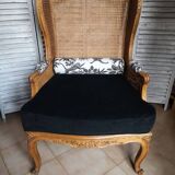 Antique wingback armchair