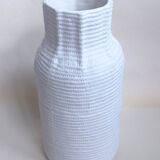 Ceramic vase cotton cladding