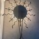 Luminous wrought iron sun mirror