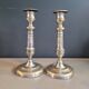 Pair of antique silver-plated brass candlesticks