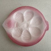 Vintage oyster plates in the shape of a sole.