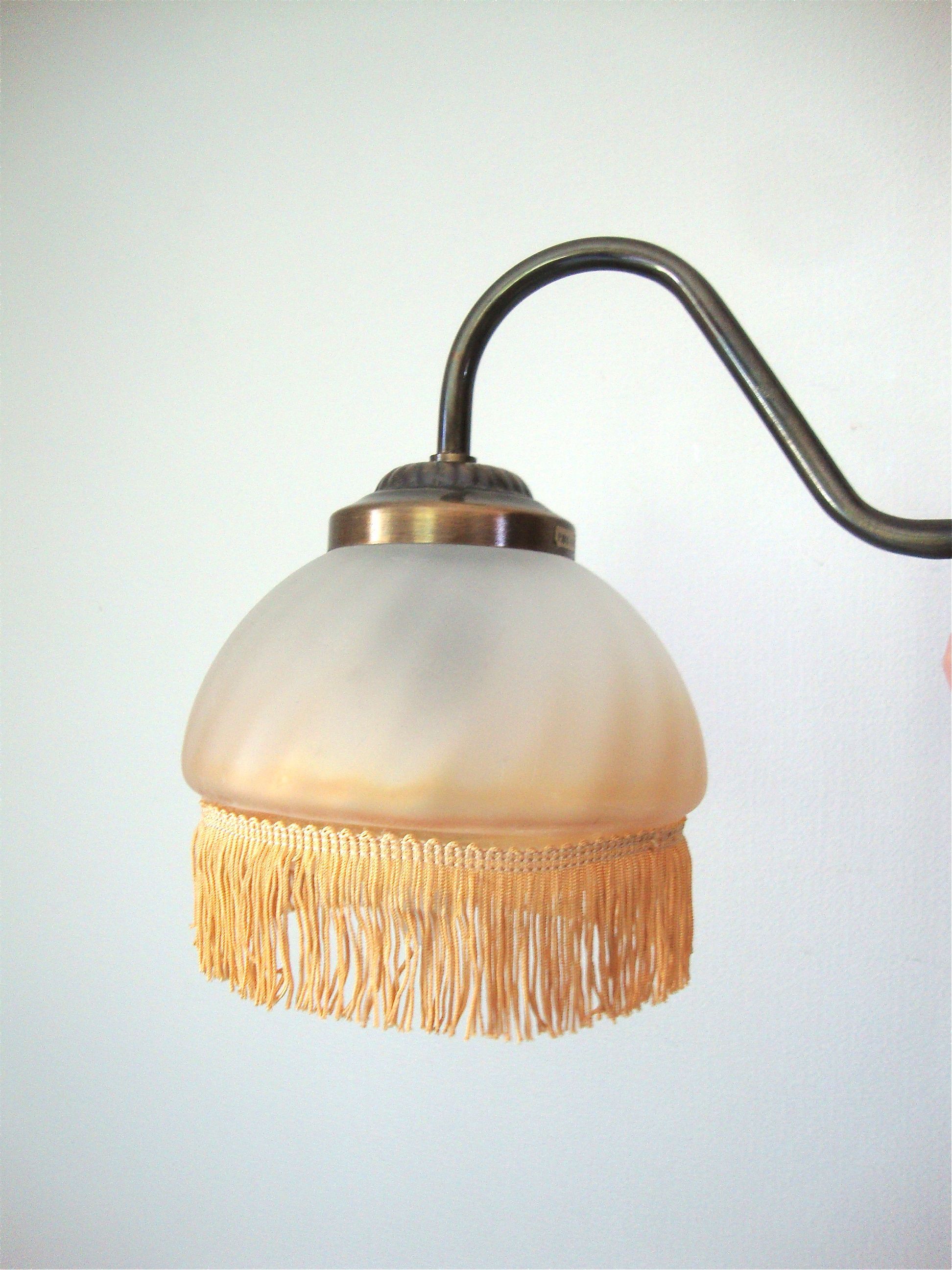 Fringed sconce