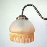 Fringed sconce
