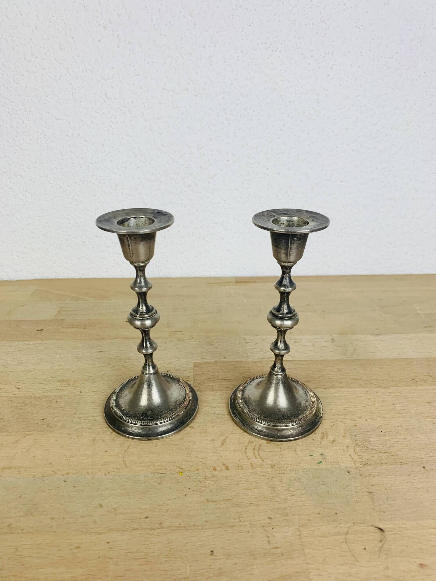 Pair of vintage silver-plated metal candlesticks