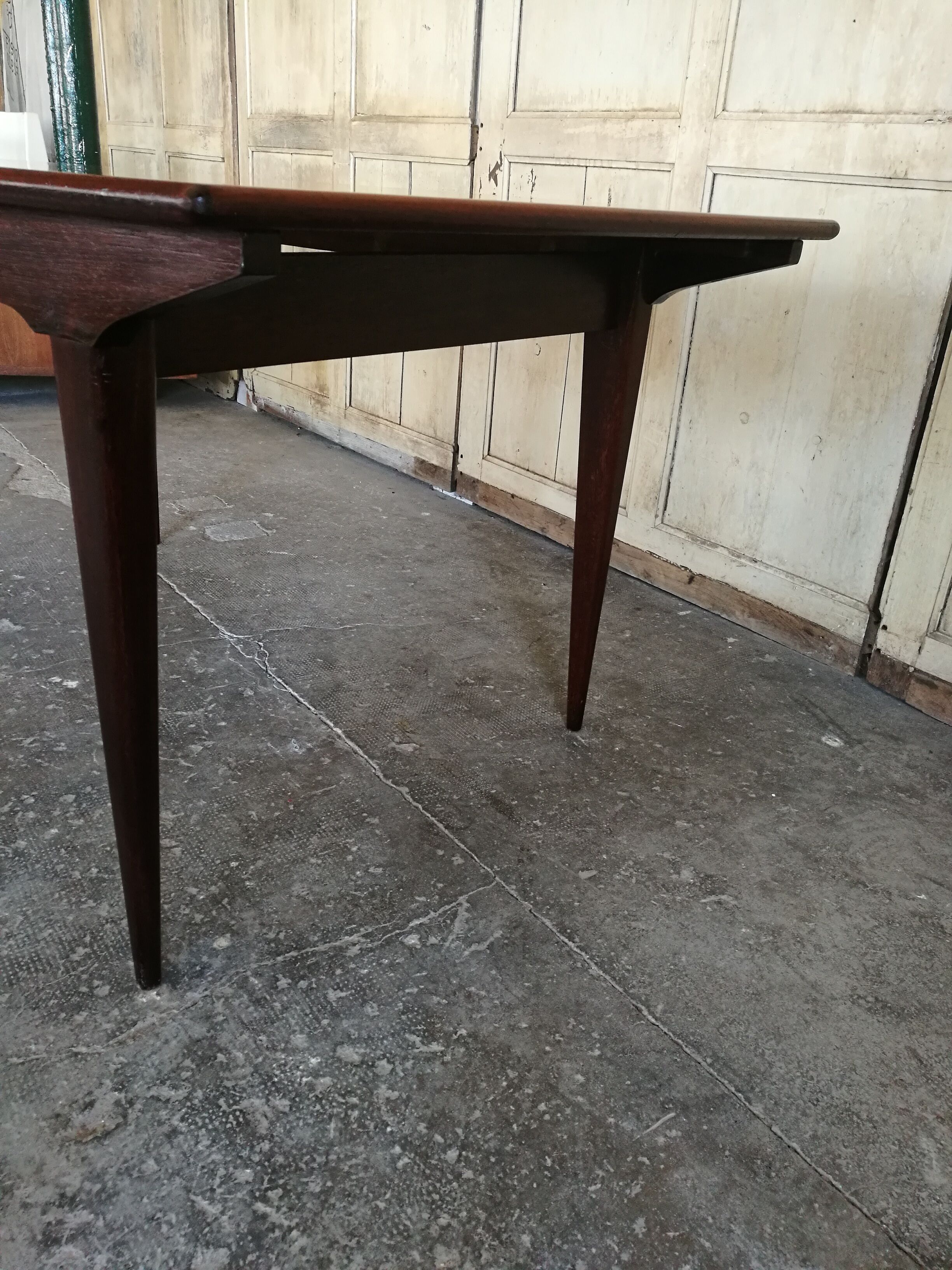 Scandinavian dining table in rosewood