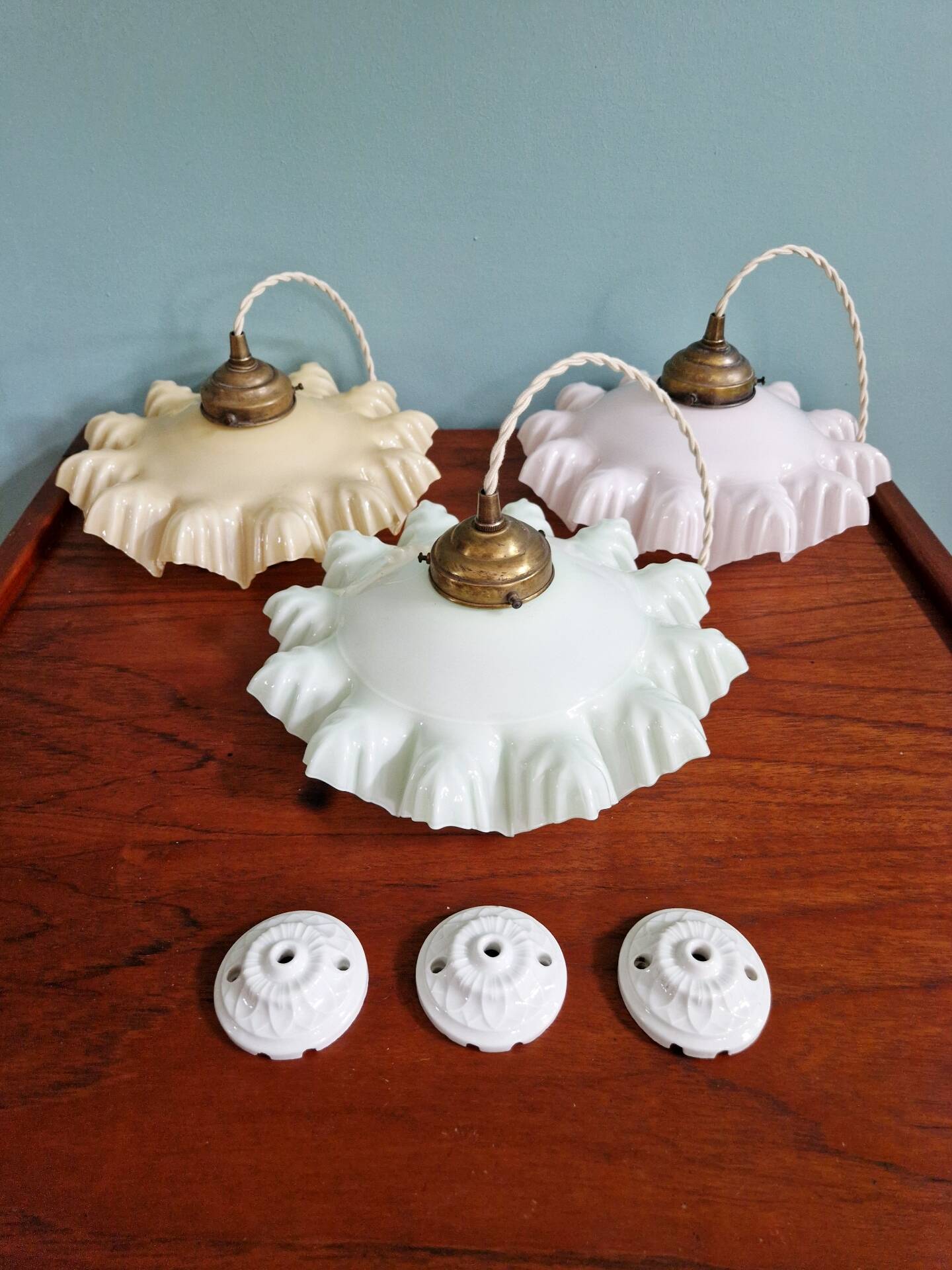 Art Deco trio of suspensions in coloured frilled opaline, 1920-30.