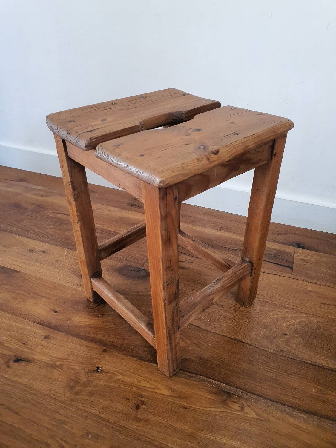 Antique wooden farm stool