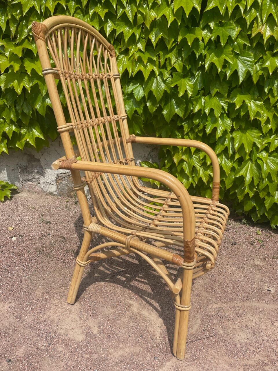 Series of 4 rattan armchairs from the 70s from the Netherlands