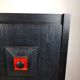 Black and red wooden brutalist bar