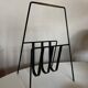 Modernist magazine rack French work 1950 in iron and brass