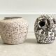Composition of a small vintage ceramic vase and a ceramic owl figurine / statue
