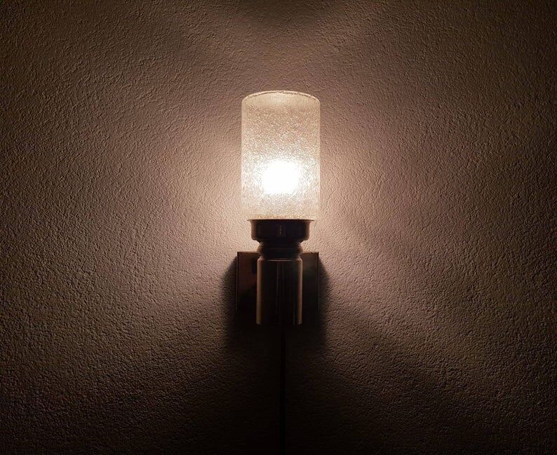 Brass applique with 1970 glass lampshade