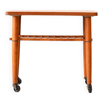 1960s teak coffee table on casters